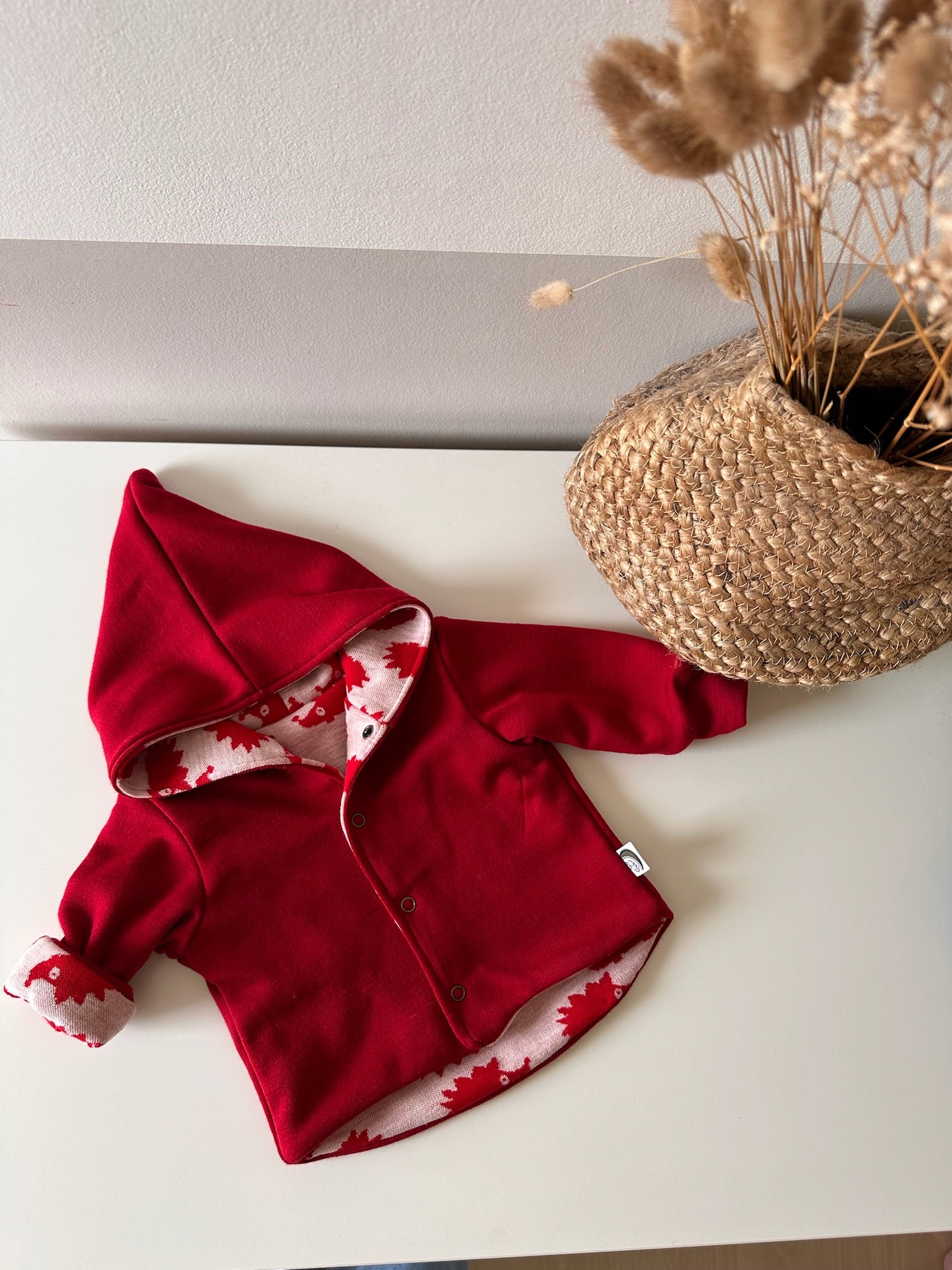 Omkeerbaar babyjasje merinowol Egeltjes Redwood
